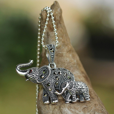Garnet and marcasite pendant necklace, 'Glistening Elephants' - Garnet and Marcasite Elephant Pendant Necklace from Thailand