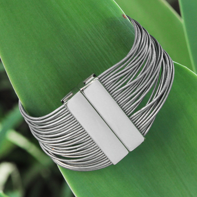 Leather and stainless steel wristband bracelet, 'Rio Glam' - Dramatic Brazilian Silver Leather Wristband Bracelet