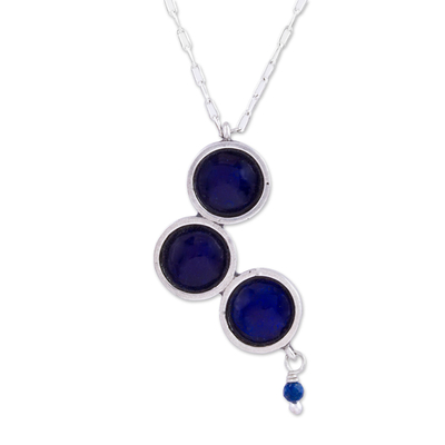 Sterling silver pendant necklace, 'Infinite Navy' - Circle Motif Lapis Lazuli Pendant Necklace from Mexico
