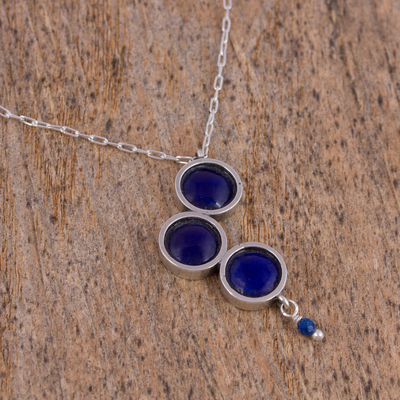 Sterling silver pendant necklace, 'Infinite Navy' - Circle Motif Lapis Lazuli Pendant Necklace from Mexico