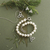 Swarovski crystal pearl charm bracelet, 'Eternal Trinity' - Trinity Knot Pearl Bracelet with Swarovski Crystals (image 2b) thumbail