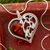 Dark cherry amber heart pendant necklace, 'Gift of the Heart' - Deep Dark Red Amber Heart Necklace