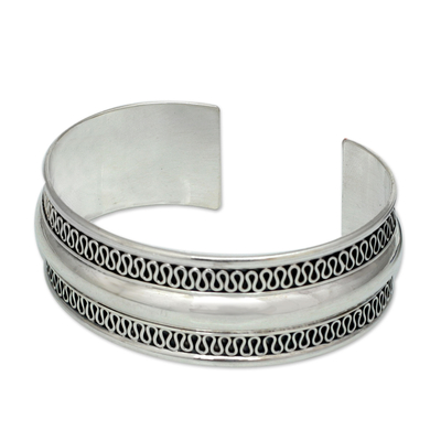 Sterling silver cuff bracelet, 'Captivated' - Hand Crafted Thai Sterling Silver Cuff Bracelet