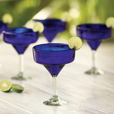 Blown glass margarita glasses, 'Ever Blue' (set of 4) - 4 Eco Friendly Hand Blown Deep Blue Margarita Glasses
