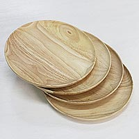 4 Artisan Crafted Wood Plates Hand Carved in Thailand,'Natural Light Discs'