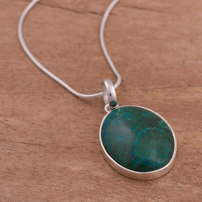Chrysocolla pendant necklace, 'Lovely Lagoon' - Oval Chrysocolla Set in Sterling Silver Pendant Necklace