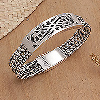 Sterling silver bangle bracelet, 'Crown of Petals' - Floral Sterling Silver Wristband Bracelet