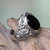 Men's onyx ring, 'Black Om Kara' - Handcrafted Onyx and Sterling Silver Om Ring for Men (image 2) thumbail