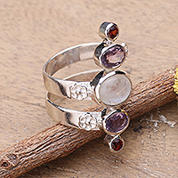 Multi-gemstone cocktail ring, 'Spiral Enchantment' - Silver Moonstone Artisan Ring with Amethyst and Garnet