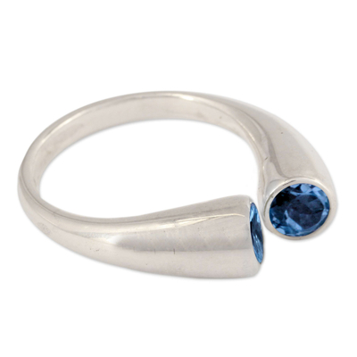 Blue topaz wrap ring, 'Face to Face' - Blue Topaz Ring 2 Cts Sterling Silver from India