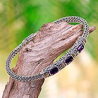 Gold accent amethyst braided bracelet, 'Bedugul Temple' - Handcrafted Bali Gold Accent Silver and Amethyst Bracelet