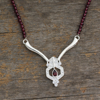 Garnet pendant necklace, 'Sophisticated Appeal' - Sterling Silver and Garnet Pendant Necklace