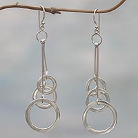 Sterling silver dangle earrings, 'Three Circles' - Sterling Silver Circular Dangle Earrings from Indonesia