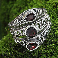 Garnet cocktail ring, 'Three Loves' - Three Stone Faceted Garnet and Silver Ring Crafted in Bali