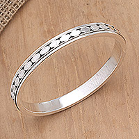 Sterling silver bangle bracelet, 'Shining Coins' - Artisan Crafted Sterling Silver Bangle Bracelet