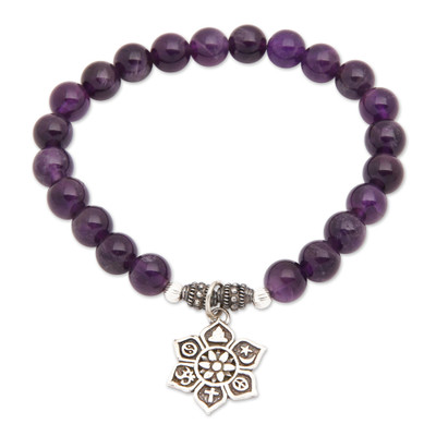 Amethyst beaded charm bracelet, 'Unity Flower' - Amethyst Religious Beaded Stretch Bracelet from Bali