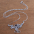 Garnet pendant necklace, 'Wild Garden' - Floral Garnet Pendant Necklace