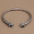 Blue topaz cuff bracelet, 'Magical Attraction' - Modern Balinese 925 Silver and Blue Topaz Cuff Bracelet