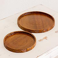 Wood trays, 'Natural Circles' (pair) - Hand Carved Conacaste Wood Trays (Pair) from Guatemala