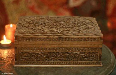 Walnut wood jewelry box, 'Mystical Garden' - Floral Carved Wood Jewelry Box