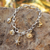 Bettelarmband mit Goldakzenten - Charm-Armband mit Mond und Sonne und Goldakzenten