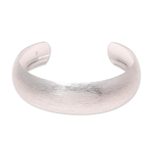 Sterling silver cuff bracelet, 'Glimmering Charm' - Brushed-Satin Sterling Silver Cuff Bracelet from India