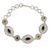 Garnet and citrine link bracelet, 'Andaman Fern Forest' - Ornate Silver Jali Bracelet with Faceted Garnets and Citrine