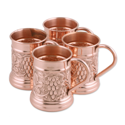 Jarras de cobre (juego de 4) - Cuatro jarras de cobre con motivos de uvas hechas a mano