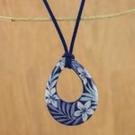 Ceramic pendant necklace, 'Flying Flowers' - Ceramic Blue Floral Pendant Necklace