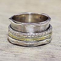 Sterling silver meditation spinner ring, 'Spinning Grace' - Handcrafted Sterling Silver and Brass Indian Spinner Ring