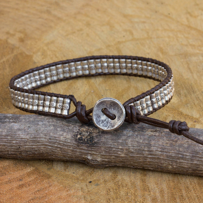 Silver and leather beaded cord bracelet, 'Karen Folk' - Hand Crafted Engraved Silver Bead and Leather Bracelet