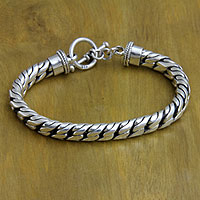 Sterling silver braided bracelet, 'Strength and Valor'