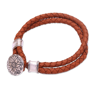 Sterling silver accent leather braided bracelet, 'Resilient Lotus' - Leather Accent Sterling Silver Bracelet with Lotus Pendant