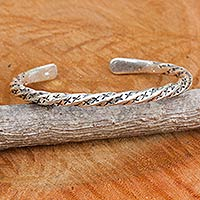 Sterling silver cuff bracelet, 'Karen Cross Spiral' - Handcrafted Sterling Silver Spiral Cuff Bracelet