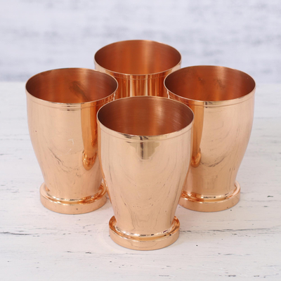 Copper cups, 'Shared Friendship' (set of 4) - Four Handcrafted Polished Copper Cups from India