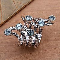Blue topaz cocktail ring, 'Spreading Goodness' - Blue Topaz and Sterling Silver Cocktail Ring