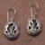 Onyx dangle earrings, 'Floral Plains' - Balinese Onyx and Sterling Silver Calla Lily Dangle Earrings
