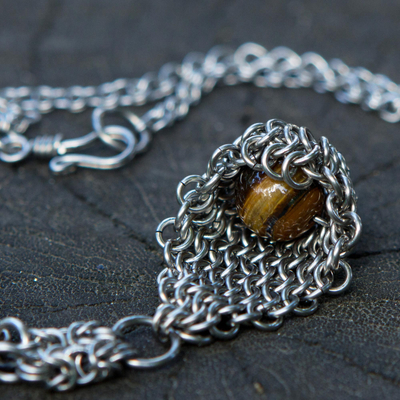 Tiger's eye statement necklace, 'Cradled Orb' - Brazilian Tiger's Eye and Stainless Steel Statement Necklace