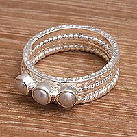 Sterling silver and cultured pearl stacking rings, 'United Moons' (set of 4) - 925 Sterling Silver Cultured Pearl Stacking Rings (Set of 4)