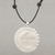 Bone pendant necklace, 'Stellar Guardians' - Handcrafted Sun and Moon Bone Pendant Necklace from Bali