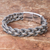 Sterling silver braided bracelet, 'Symmetry' (7.25 inch) - Fair Trade Sterling Silver Wristband Bracelet (7.25 Inch)