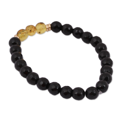 Gold accented amber and agate beaded stretch bracelet, 'Ancient Alignment' - Gold Accented Amber and Black Agate Stretch Bracelet