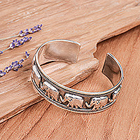 Sterling silver cuff bracelet, 'Grand Elephant Parade' - Artisan Crafted Sterling Silver Elephant Cuff Bracelet