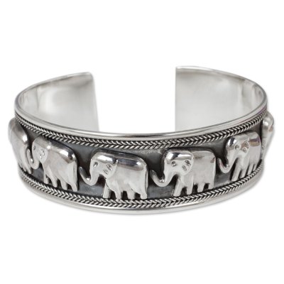 Sterling silver cuff bracelet, 'Grand Elephant Parade' - Artisan Crafted Sterling Silver Elephant Cuff Bracelet