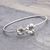 Sterling silver floral bracelet, 'Frangipani Stars' - Floral Sterling Silver Bangle Bracelet
