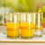 Highball aus mundgeblasenem Glas, „Ribbon of Sunshine“ (5er-Set) – Set aus 5 Trinkgläsern aus mundgeblasenem Recyclingglas mit orangefarbenen Streifen