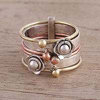 Sterling silver and copper meditation spinner ring, 'Metallic Flowers'