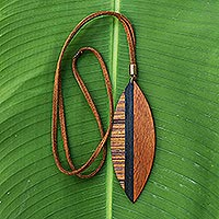 Wood pendant necklace, 'Jungle Beauty' - Long Brown Wood Pendant Necklace from Brazil