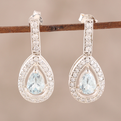 Blue topaz dangle earrings, 'Arctic Tear' - Artisan Crafted Blue Topaz and Cubic Zirconia Earrings