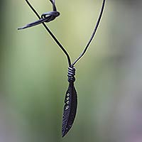 Men's leather and horn pendant necklace, 'Crow Feather Totem' - Hand Carved Horn Necklace on Leather Cords